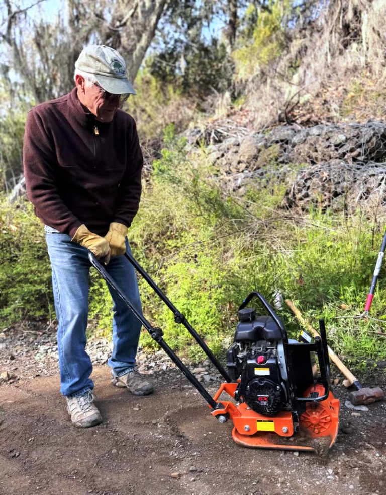 Bruce compacting the path.